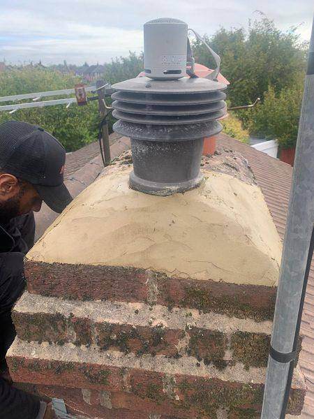 The crown re-flaunched in fresh mortar and shaped to fall away