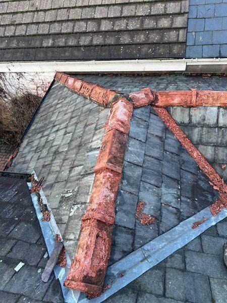 Before: powdery mortar broken out of the joints and spread down the slope