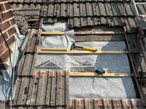New membrane and battens going in where the tiles came off