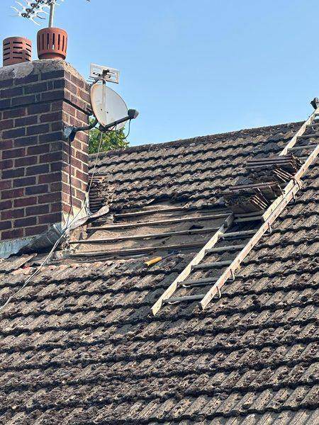 A section opened up beside the stack, ladder laid up the slope