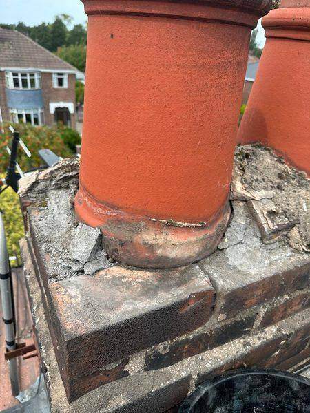 The old bedding round a pot, cracked and breaking away