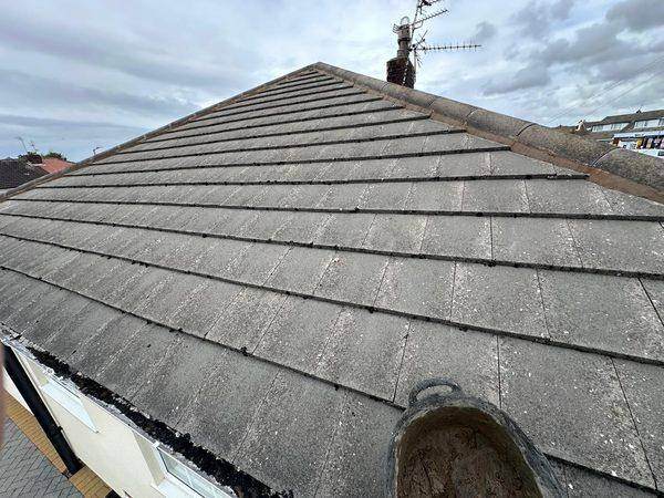 The renewed ridge and hip lines along the finished roof