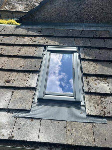 The finished window flush in the tiles, apron dressed down