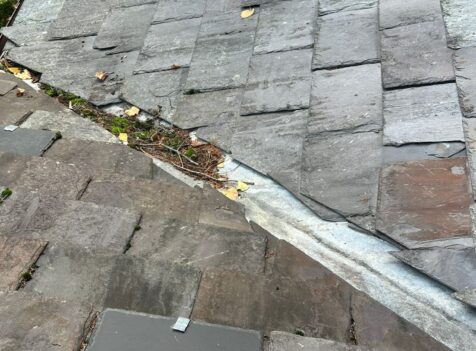 repair slipped slates in prestbury
